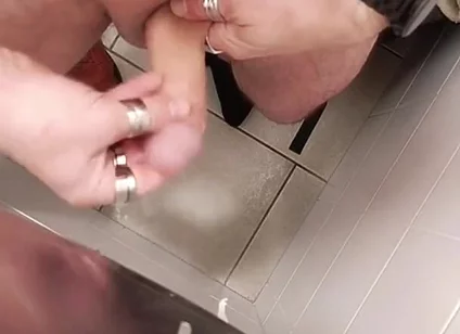 Jerking off a Cock in a Public Toilet