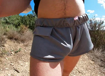 Fit Guy Walks in Short Shorts Without Underwear