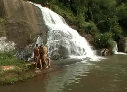 Three Nude in the River