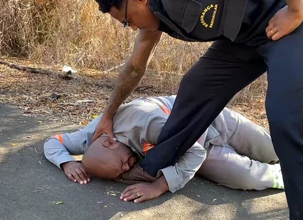 Vigilante Humiliating the Worker