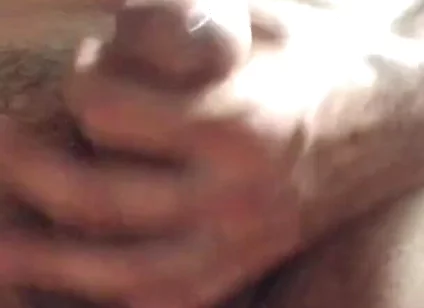 Masturbating