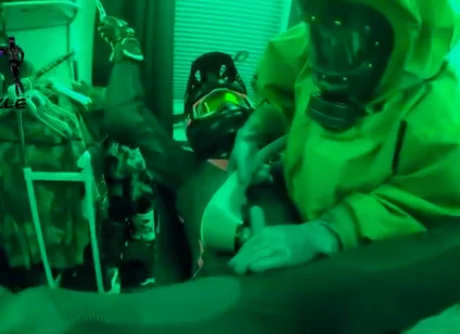 Hazmat gear boys fucking biker in sling