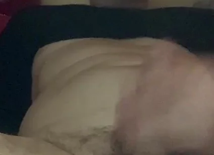Masturbating