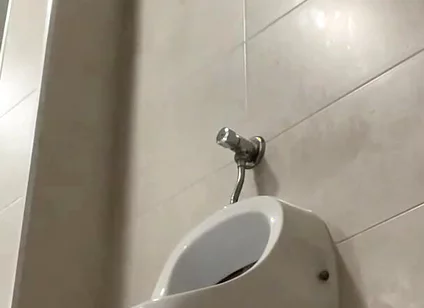 Amateur Twink Boy and Older Guy Caught Having Risky Fun in the Pool's Public Toilets