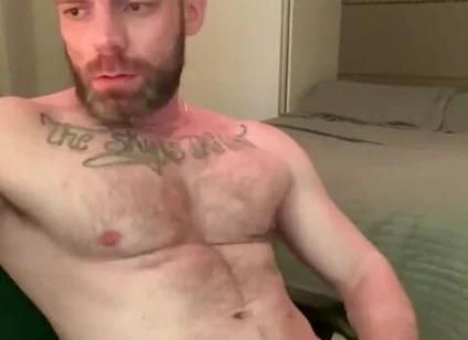 Masturbating