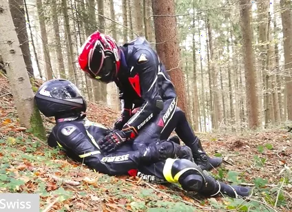 German dainese bikers having fun in the wood