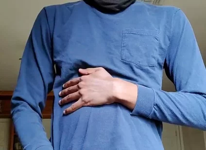 Masturbating