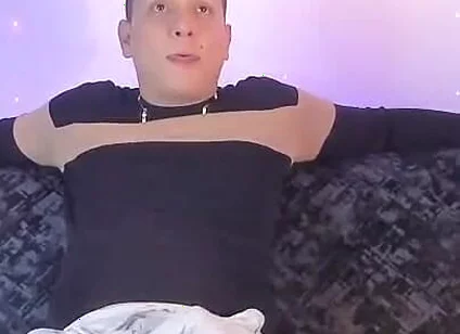Latino Shows off His Bump on Camera Inside His Gray Sweatshirt