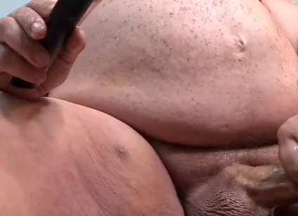 Big Bear Shoots a Load From His Huge Cock