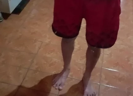 Boy in Red Shorts
