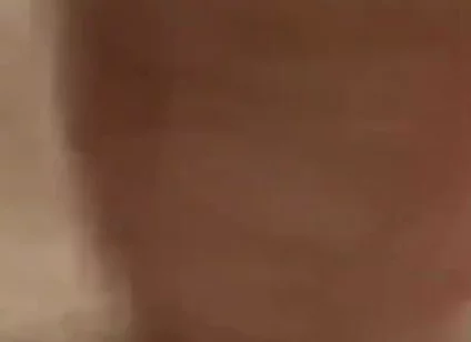 Masturbating