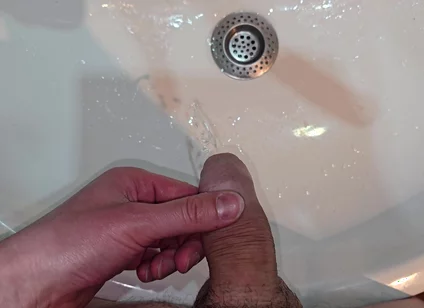 Pissing to the Bathroom Sink
