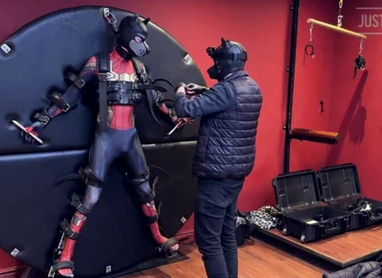 Pup Twink Dressed as Spider-man Strapped to the Bondage Wheel and Milked