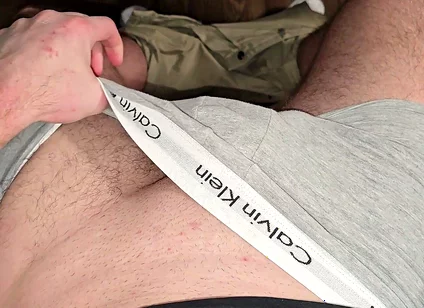 German masked guy rubs huge bulge.. grey Calvins down.. cock dripping heavy