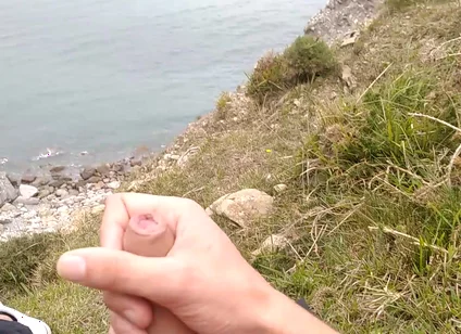 Big Beautiful Big Fat Cock Gets Handjob on the Beach with Gorgeous Sea Views