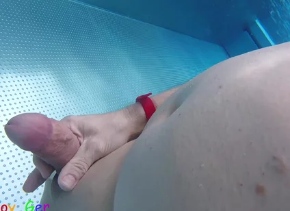 Naked in a Public Outdoor Pool, I Play with My Smooth, Uncut Cock.