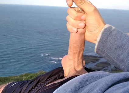 Huge Dirty Cock Gets Handjob on the Beach and Squirts a Lot of Thick Sperm in Front of the Beach