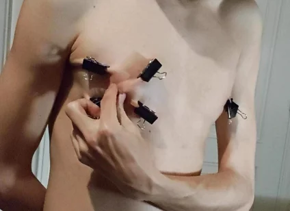 Twink Playing with Binder Clips