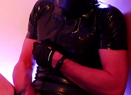 Rubber Slave Jerking off