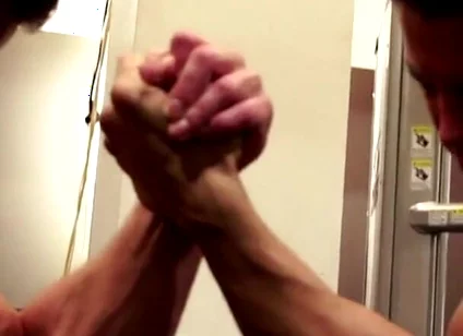 Amateur Fitness Guys Arm Wrestle in the Gym