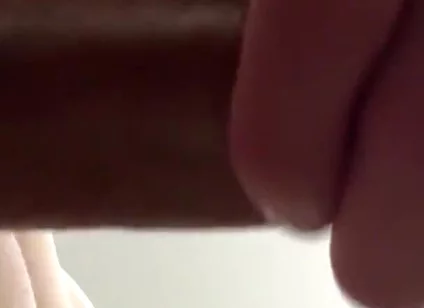 Masturbating