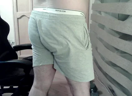 Muscular Camboy Flexes His Muscles and Squats