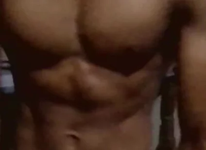 Showing His Abs and Core Area