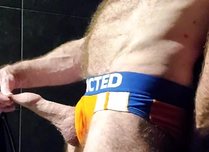 Muscle Bear Showing off His Uncut Cock