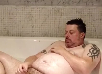 In the Big Bath Having a Wank