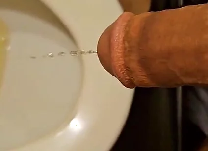Shaved Cock Pissing