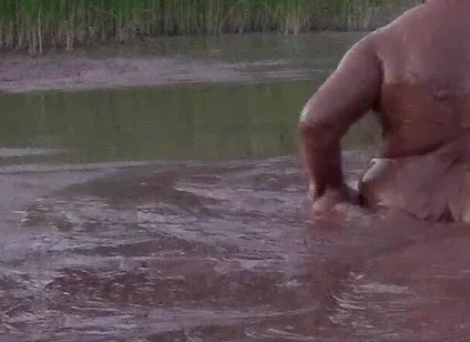 Mud Bath in Deep Quarry Mud Pond