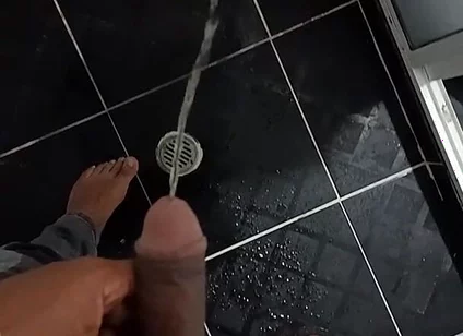 Urinating in Dark Jeans