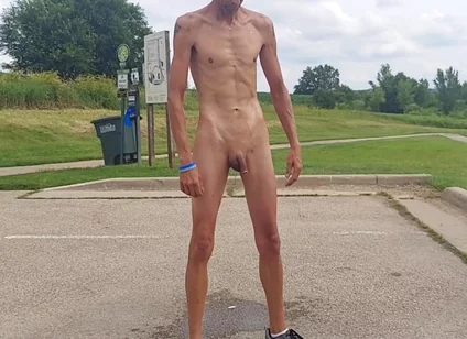 Naked and Pissing in Parking Lot