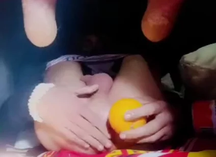 A Young Man Stuffs a Crystal Ball and an Orange up His Tight Ass.
