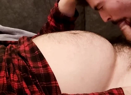 Sucking off a Hairy Bear on the Sofa