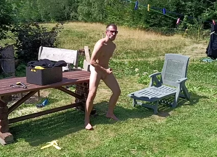 Jerking off While Hanging Out the Laundry