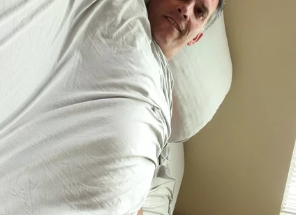 Duke Silver Plays the Trombone in Bed