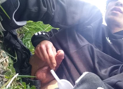 Gay boy Jon Arteen, wearing adidas tracksuit Campus sneakers, gets a hard-on outdoors