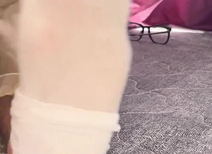 A University Rests Her Feet on Her Face so That the Adorers