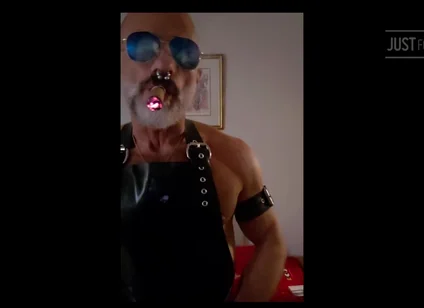 Stepdad lighting his Cigar in rubber apron