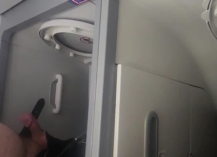Airplane Bathroom Jerk and Cum.