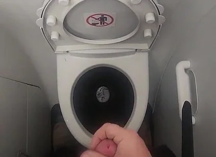 Airplane Bathroom Jerk and Cum.