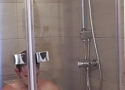 After a Full Day on the Road Wet Solo in the Hotel Shower