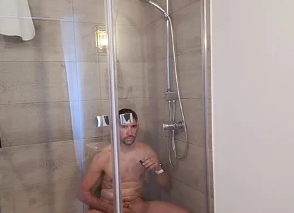 After a Full Day on the Road Wet Solo in the Hotel Shower