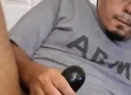 Browndicksavior Using His Oral Sex Toy and Stroking His Brown Cock