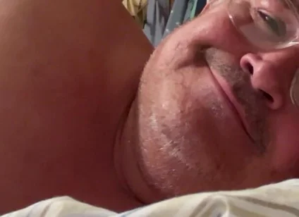Man Lying in Bed