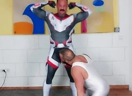 Muscle Daddy - Muscle Man Tries On Spandex Cosplay Suit With The Help Of His Muscle Stepdaddy