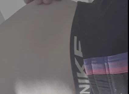 Young Man Holds a Full Bladder