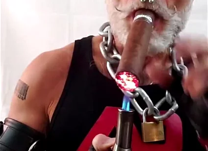 Leather Dad Lighting a Big Ring