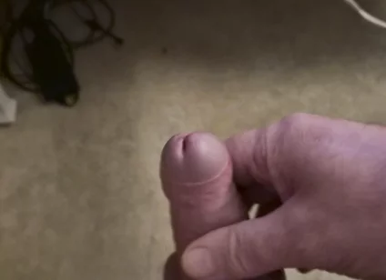 My Friend Sits in a Chair and Jerks off His Cock While Watching Video